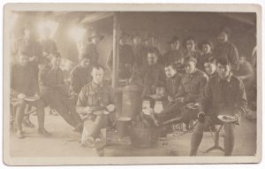 Australian soldiers in a mess tent (World War One postcard)