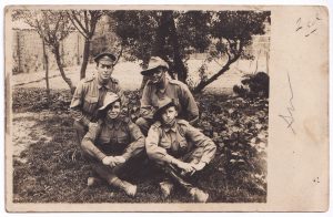 Photo of four Australian soldiers (World War Two postcard)