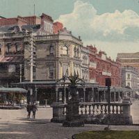 Postcard, with a photo of a Sydney street scene
