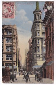 Postcard, with a photo of a Melbourne street scene (Flinders Lane)
