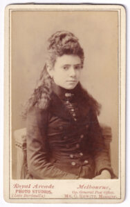 Carte de visite, with a photograph of a woman, from the late 19th century, circa 1878