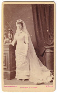 Carte de visite, with a photograph of a woman, from the late 19th century